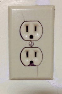 old broken electrical outlet 
