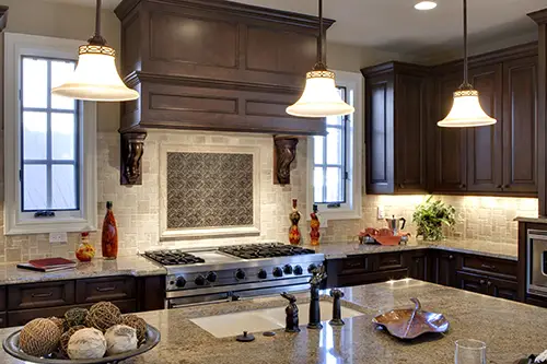 Modern kitchen with pendant lighting and under-cabinet lights